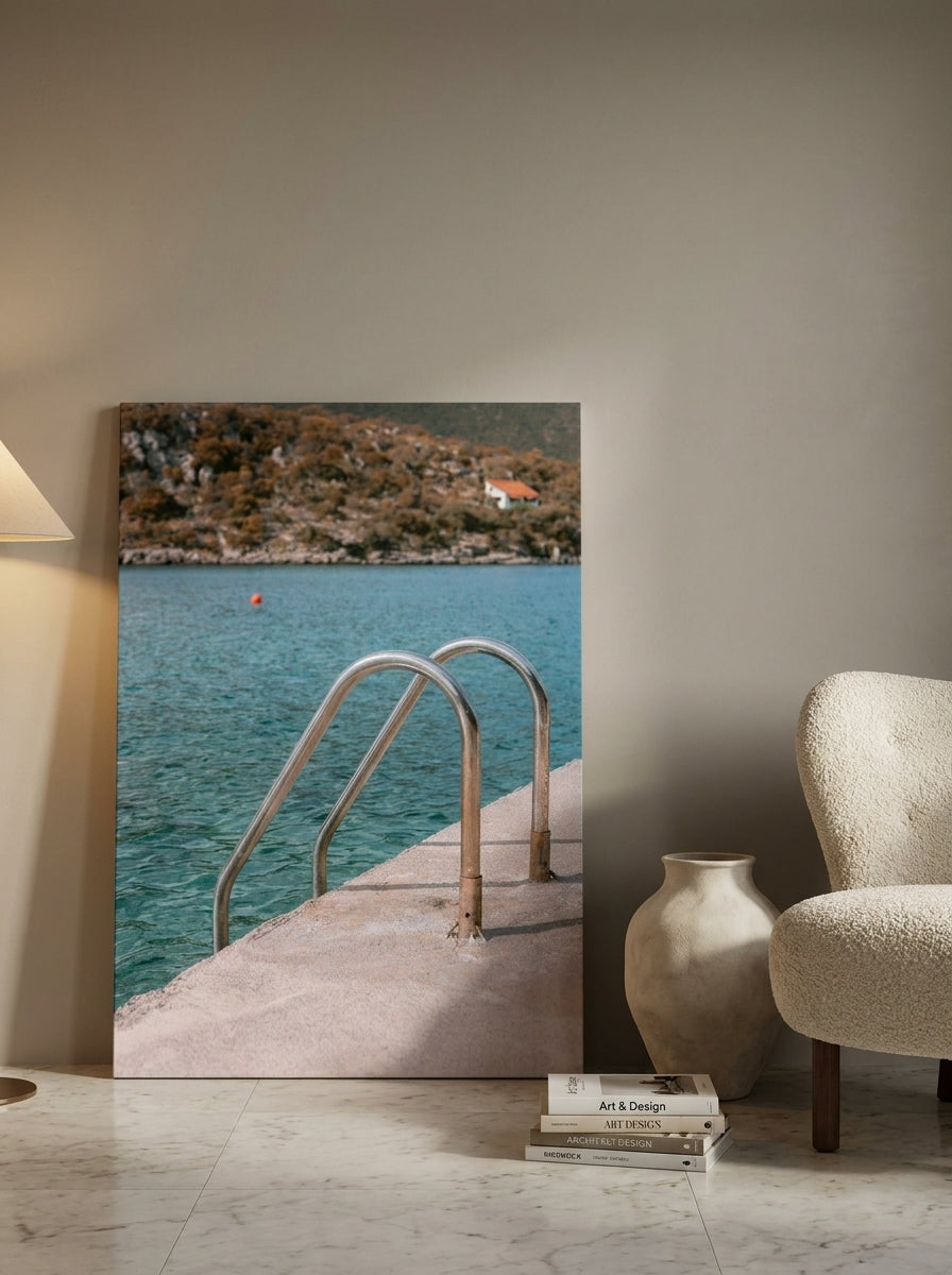 Stretched canvas wall art leaning against the wall in a luxe bathroom