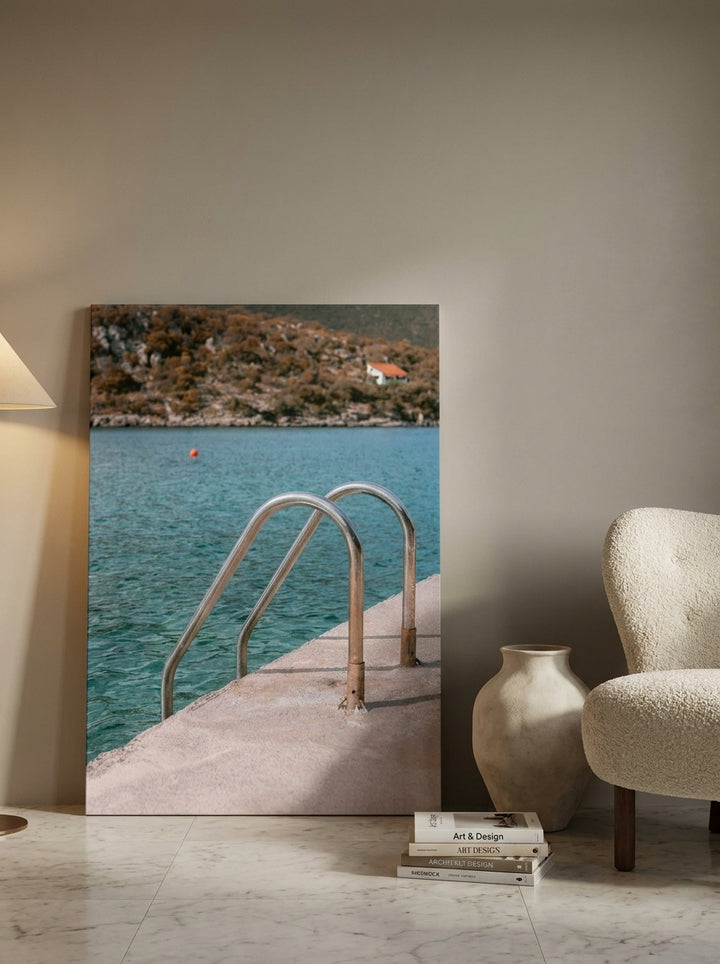 Stretched canvas wall art leaning against the wall in a luxe bathroom