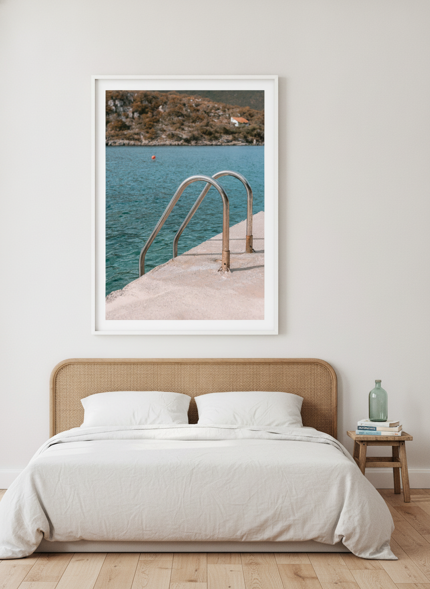 Oversized statement modern wall art print styled on the wall in a coastal bedroom