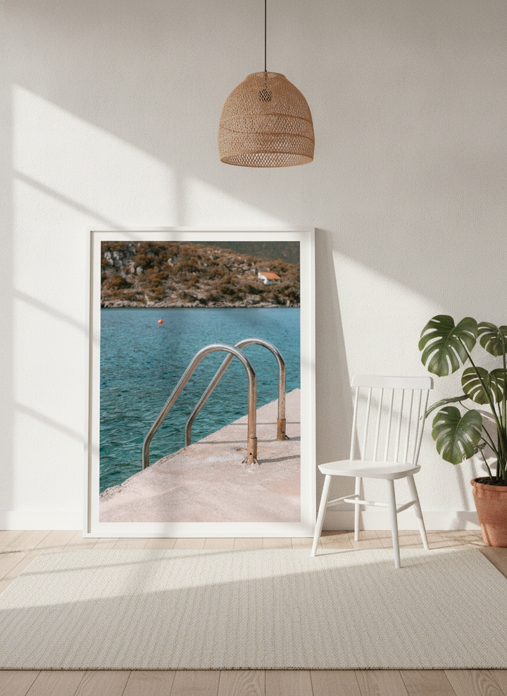 Oversized statement modern wall art print leaning against the wall in a bright Scandinavian living room