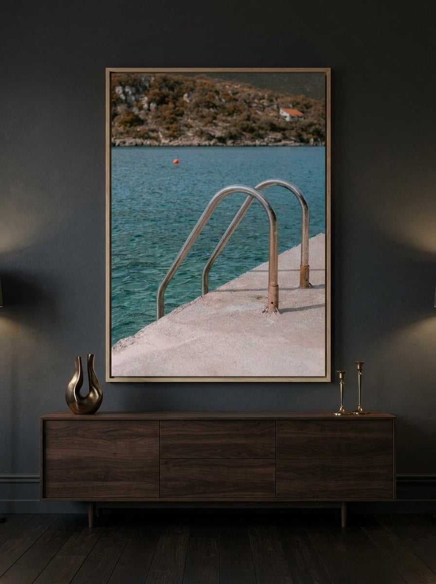 Oversized statement canvas wall art with a natural timber surround styled on the wall in a moody living room