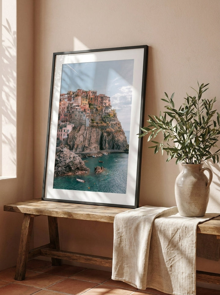 Modern wall art print standing on a bench in a Mediterranean home office