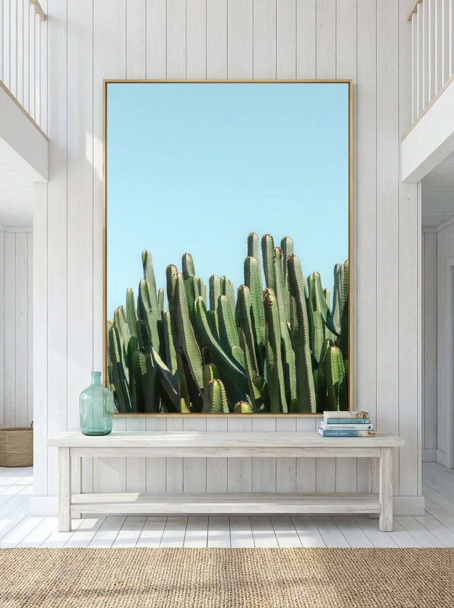 Oversized statement modern wall art print styled on the wall in a coastal living room