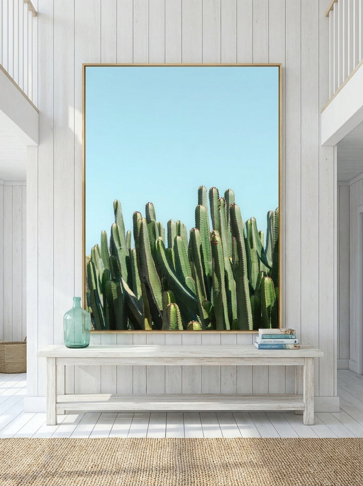 Oversized statement modern wall art print styled on the wall in a coastal living room