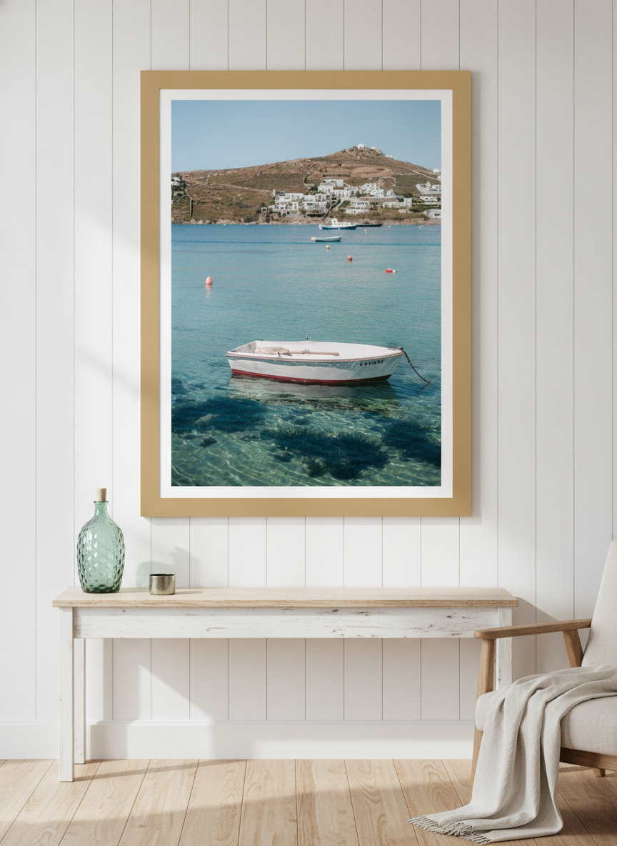 Modern wall art print styled on the wall in a coastal living room