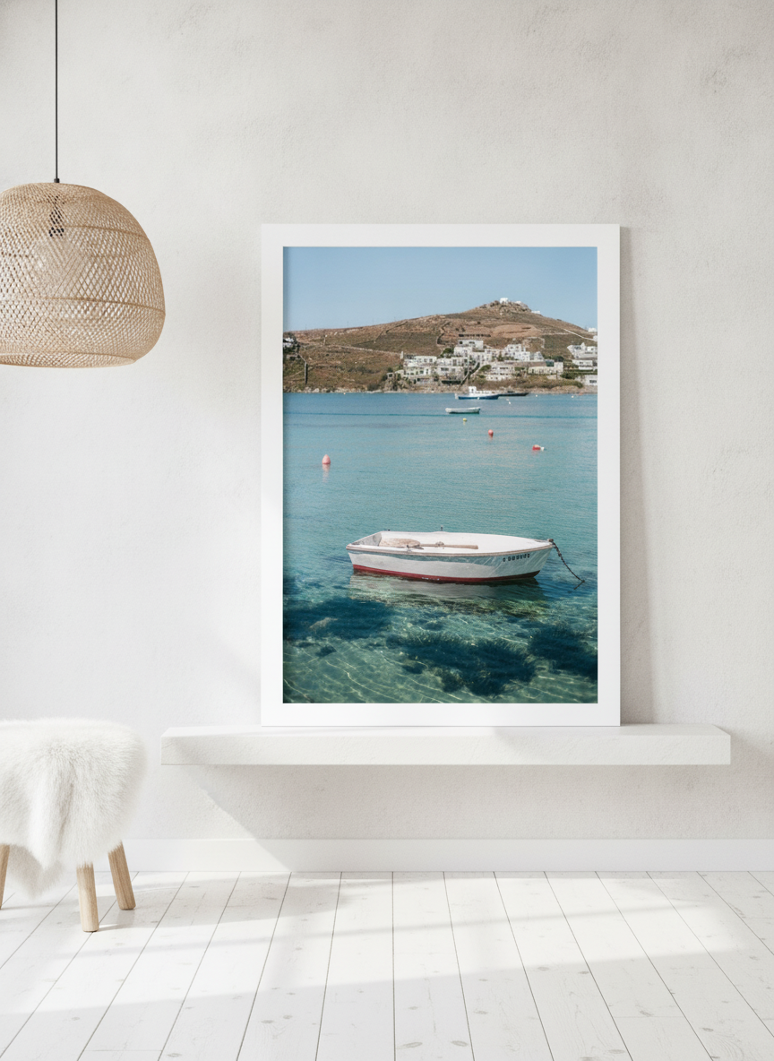Modern wall art print standing on a shelf in a bright Scandinavian bedroom