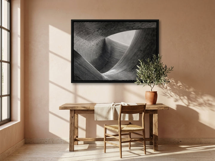 Canvas wall art with a black surround styled on the wall in a Mediterranean home office