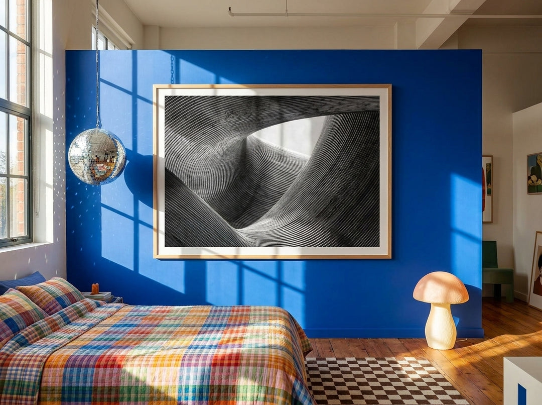 Oversized statement modern wall art print styled on the wall in a colourful eclectic bedroom