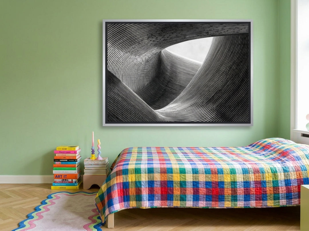 Canvas wall art with a silver leaf surround styled on the wall in a colourful eclectic bedroom