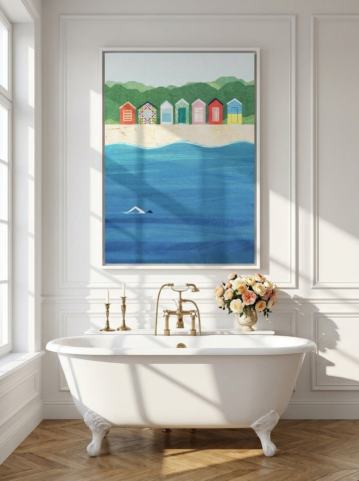 Canvas wall art with a white surround styled on the wall in a Parisian bathroom