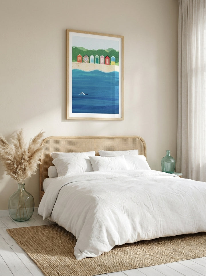 Modern wall art print styled on the wall in a coastal bedroom