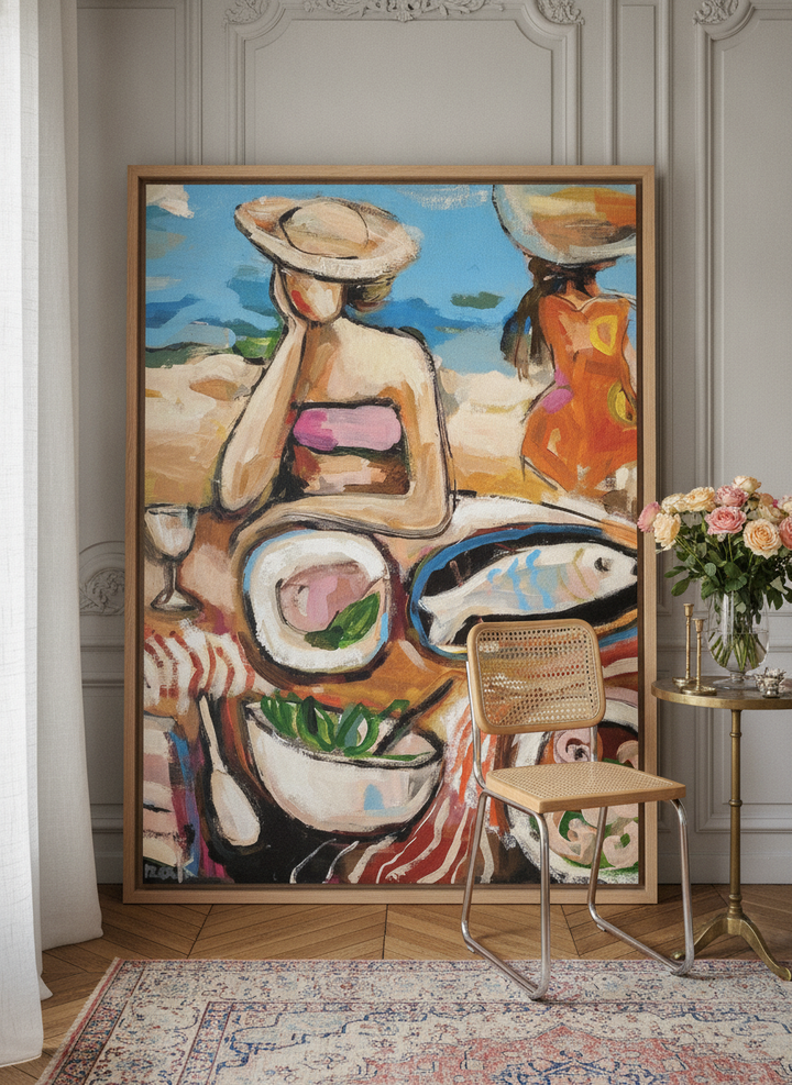 Oversized statement canvas wall art with a natural timber surround leaning against the wall in a Parisian living room