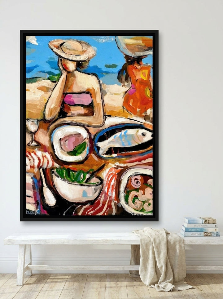 Canvas wall art with a black surround styled on the wall in a coastal living room