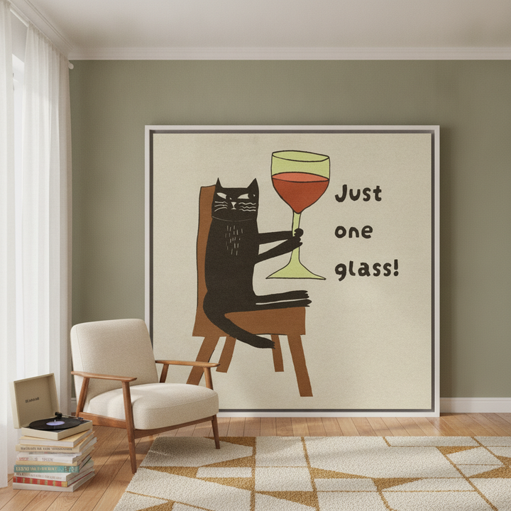 Oversized statement canvas wall art with a white surround leaning against the wall in a mid-century living room