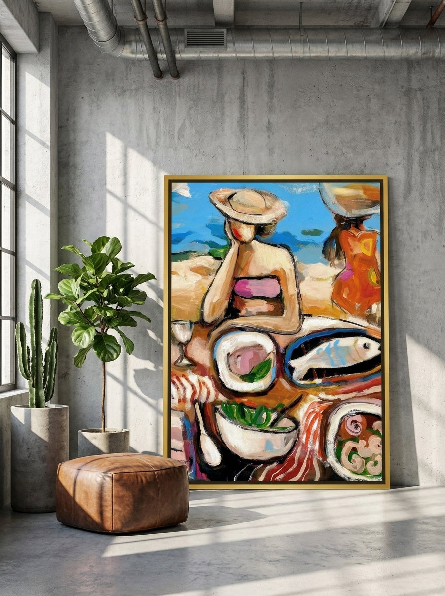 Oversized statement canvas wall art with a gold leaf surround leaning against the wall in an industrial loft dining room
