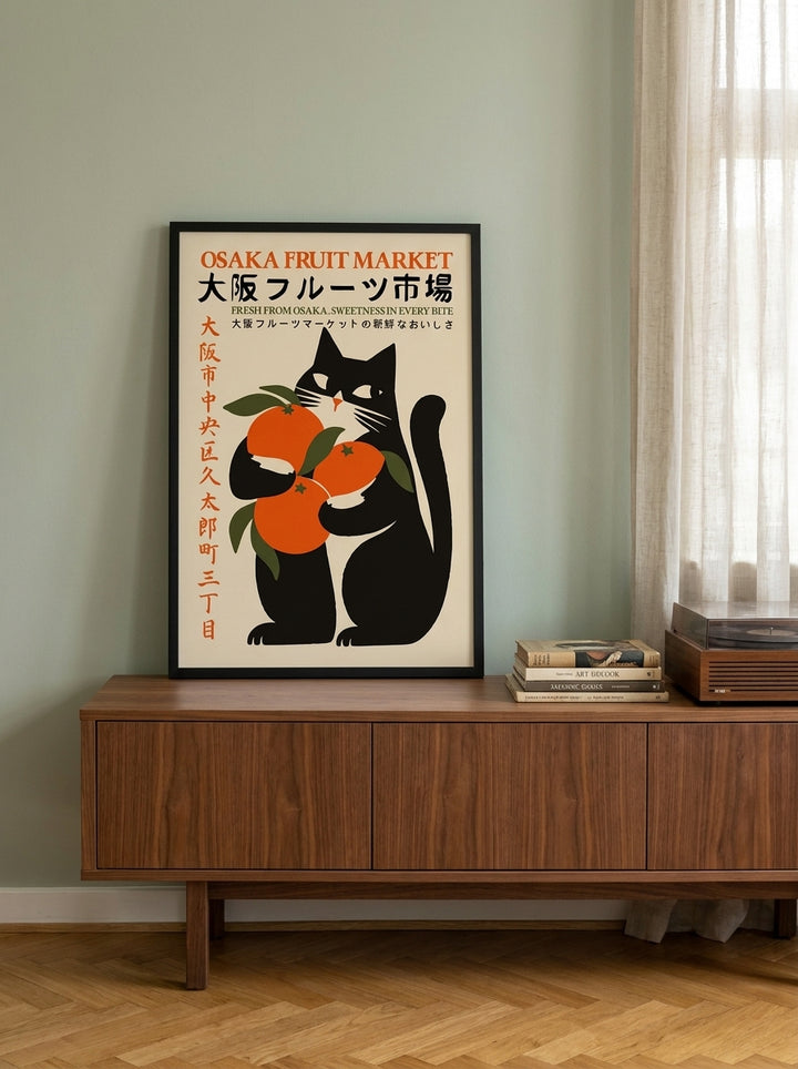 Modern wall art print standing on a sideboard in a mid-century home office