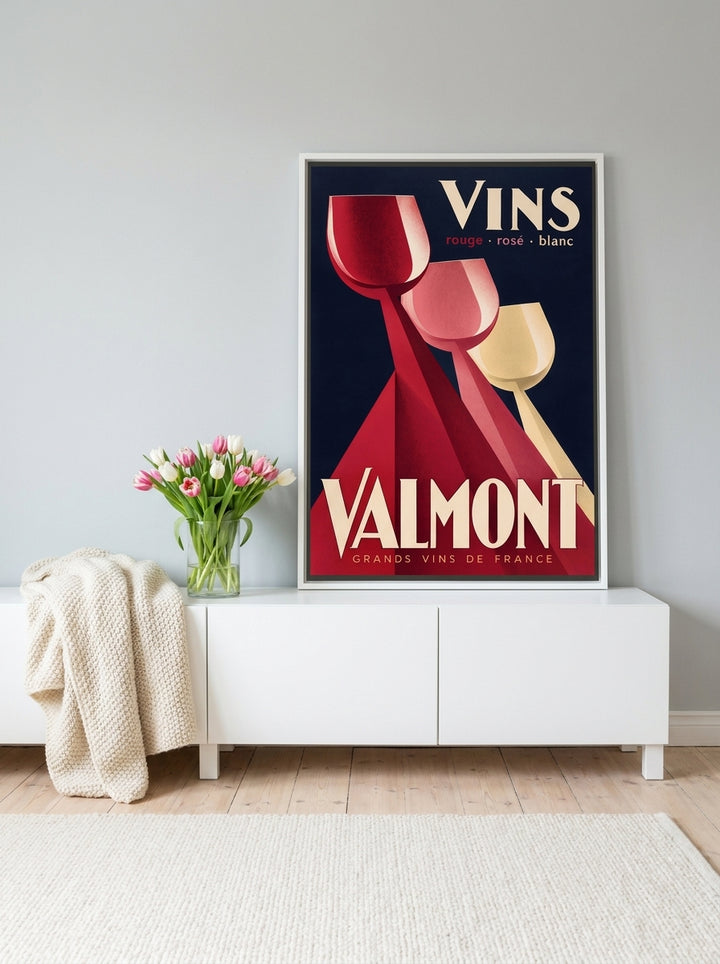 Canvas wall art with a white surround standing on a sideboard in a bright Scandinavian dining room
