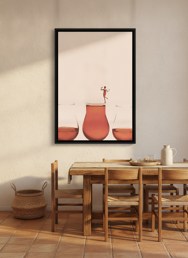 Canvas wall art with a black surround styled on the wall in a Mediterranean dining room
