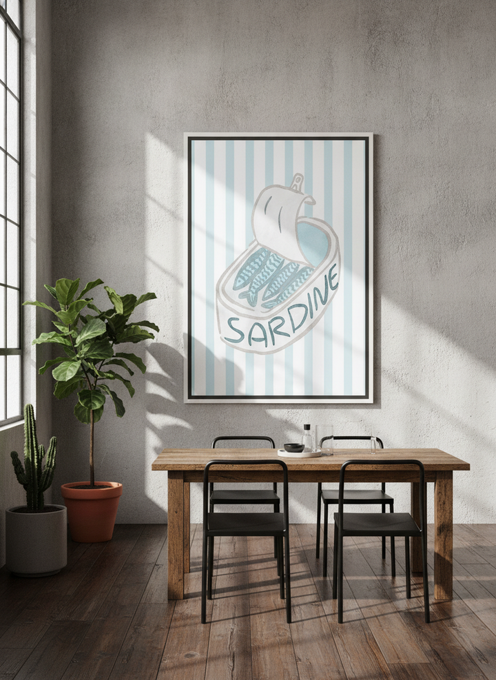 Oversized statement canvas wall art with a white surround styled on the wall in an industrial loft dining room