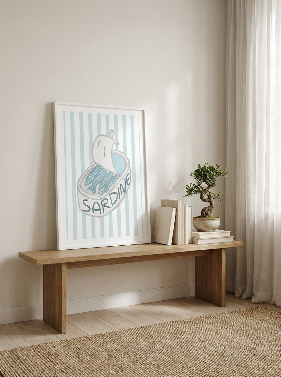 Modern wall art print standing on a bench in a warm Japandi dining room