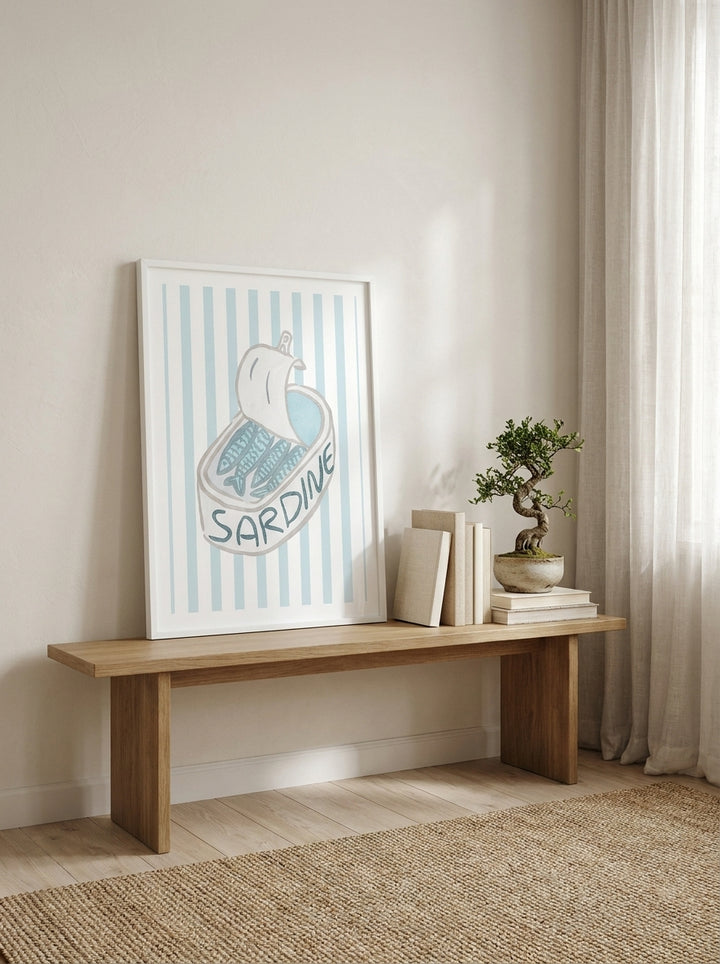Modern wall art print standing on a bench in a warm Japandi dining room