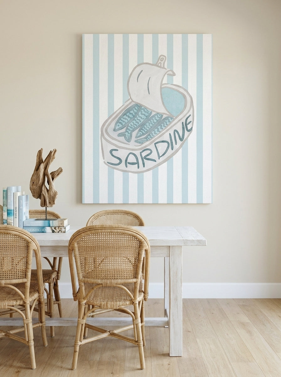 Stretched canvas wall art styled on the wall in a coastal dining room