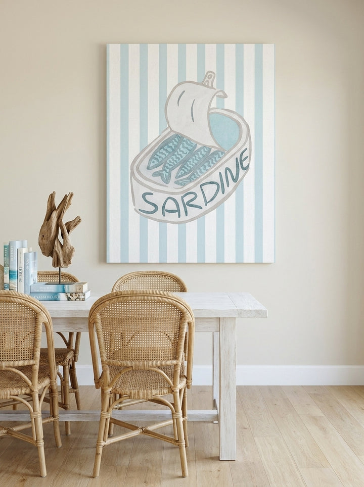Stretched canvas wall art styled on the wall in a coastal dining room