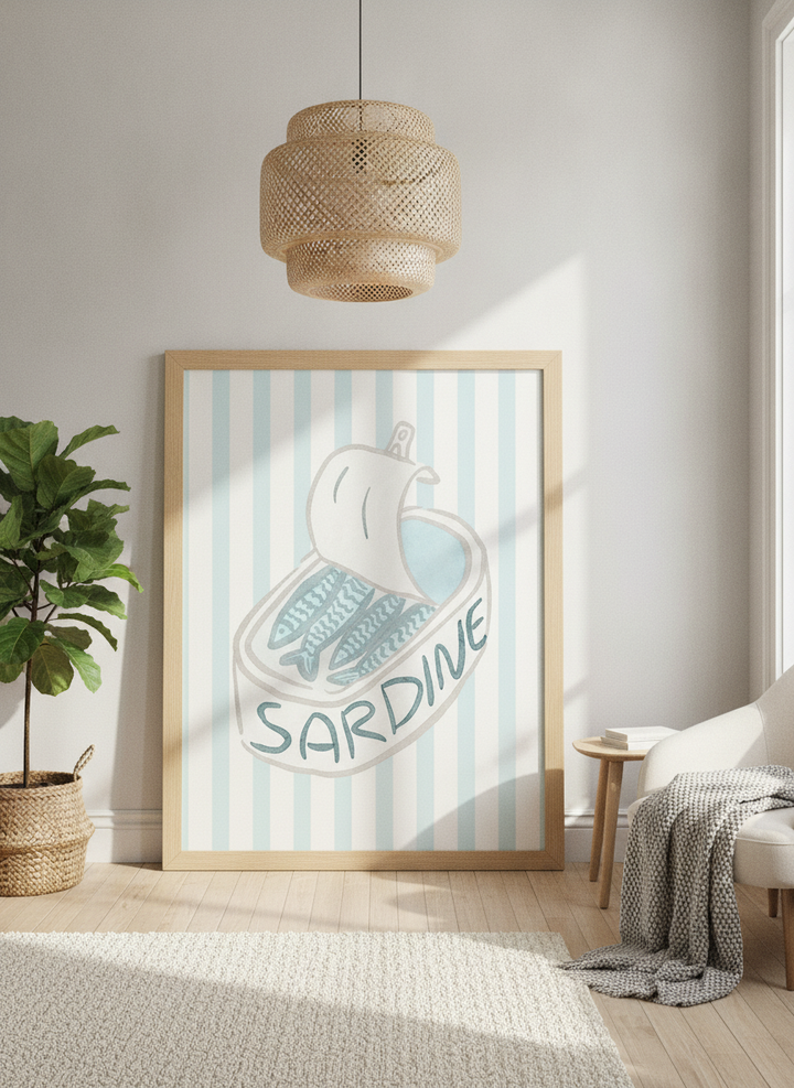 Oversized statement modern wall art print leaning against the wall in a bright Scandinavian living room