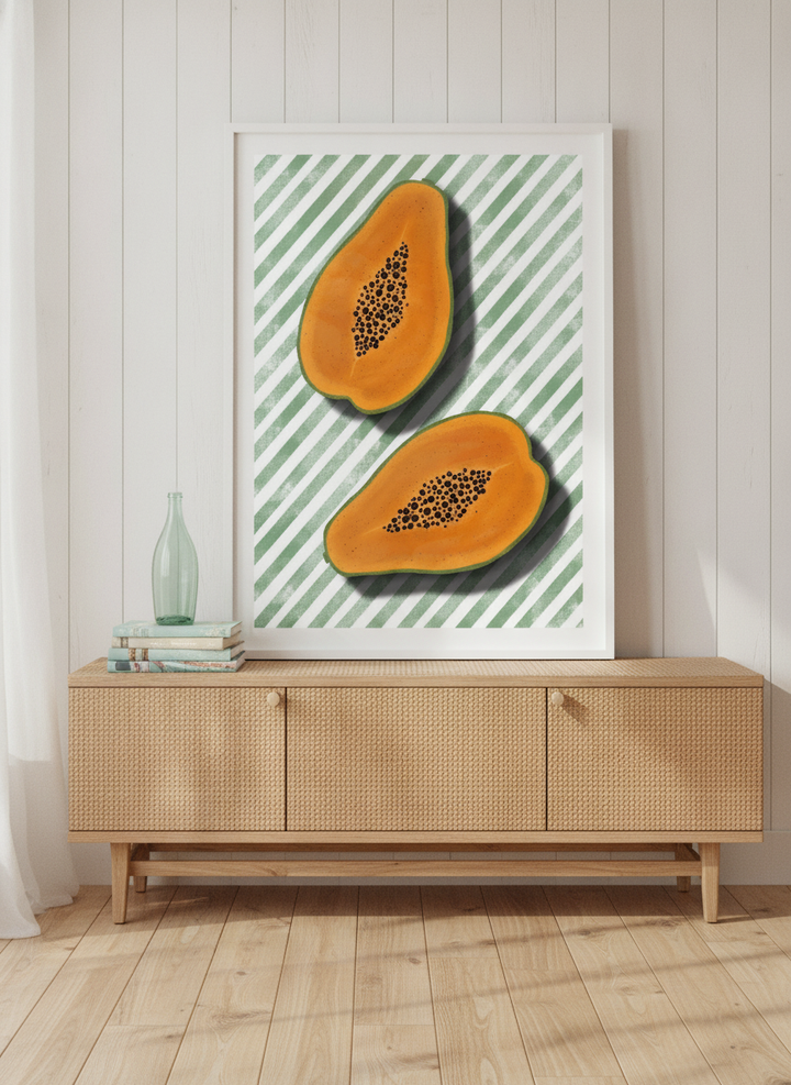 Modern wall art print standing on a sideboard in a coastal living room