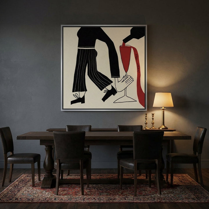 Canvas wall art with a silver leaf surround styled on the wall in a moody dining room