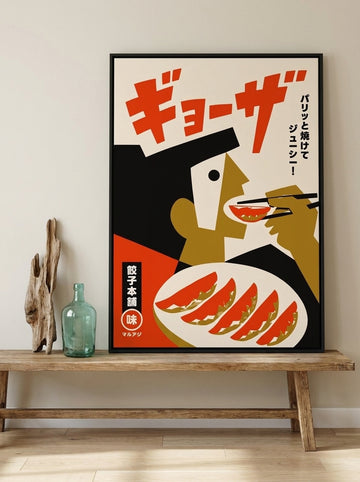 Canvas wall art with a black surround standing on a kitchen bench in a coastal kitchen