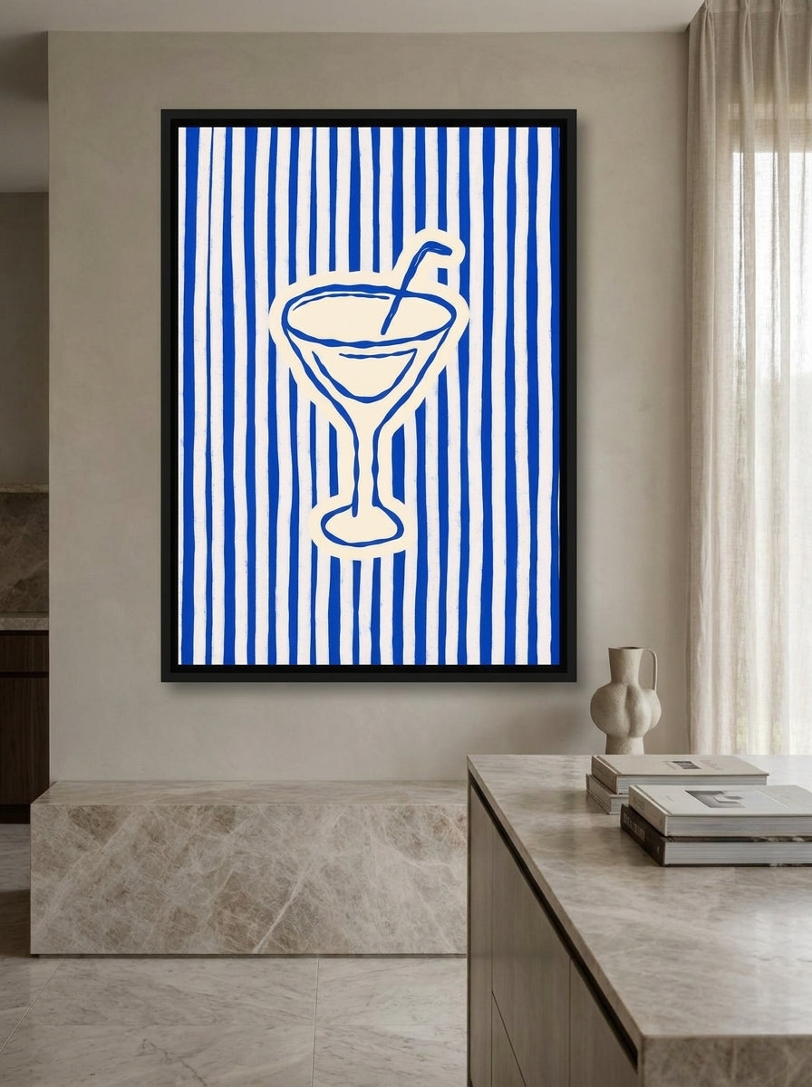 Canvas wall art with a black surround styled on the wall in a luxe kitchen