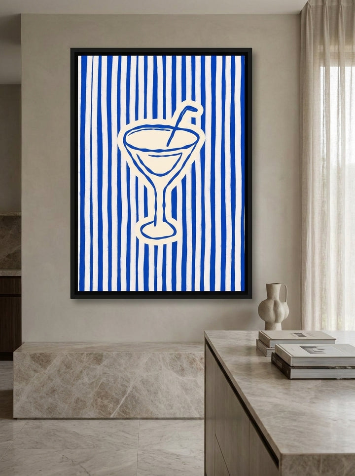 Canvas wall art with a black surround styled on the wall in a luxe kitchen