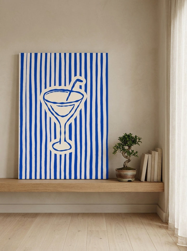 Stretched canvas wall art standing on a shelf in a warm Japandi living room