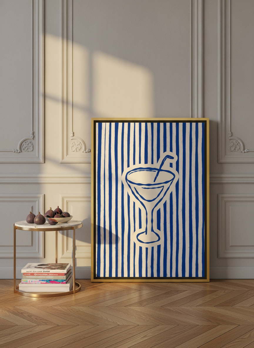 Canvas wall art with a gold leaf surround leaning against the wall in a Parisian living room
