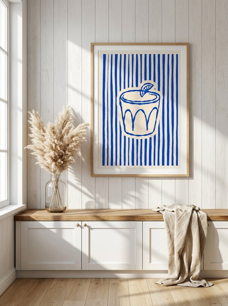 Modern wall art print styled on the wall in a coastal kitchen