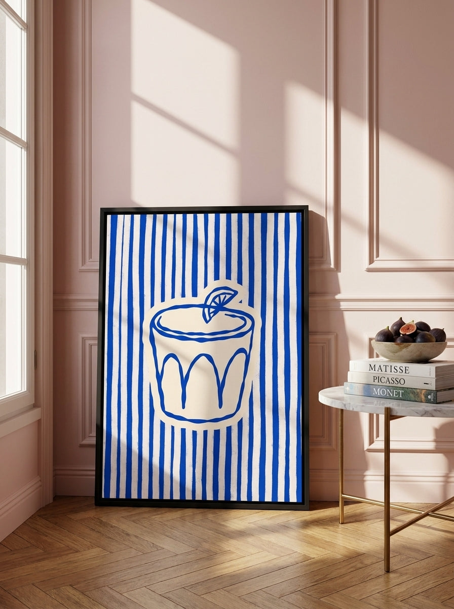 Canvas wall art with a black surround leaning against the wall in a Parisian kitchen