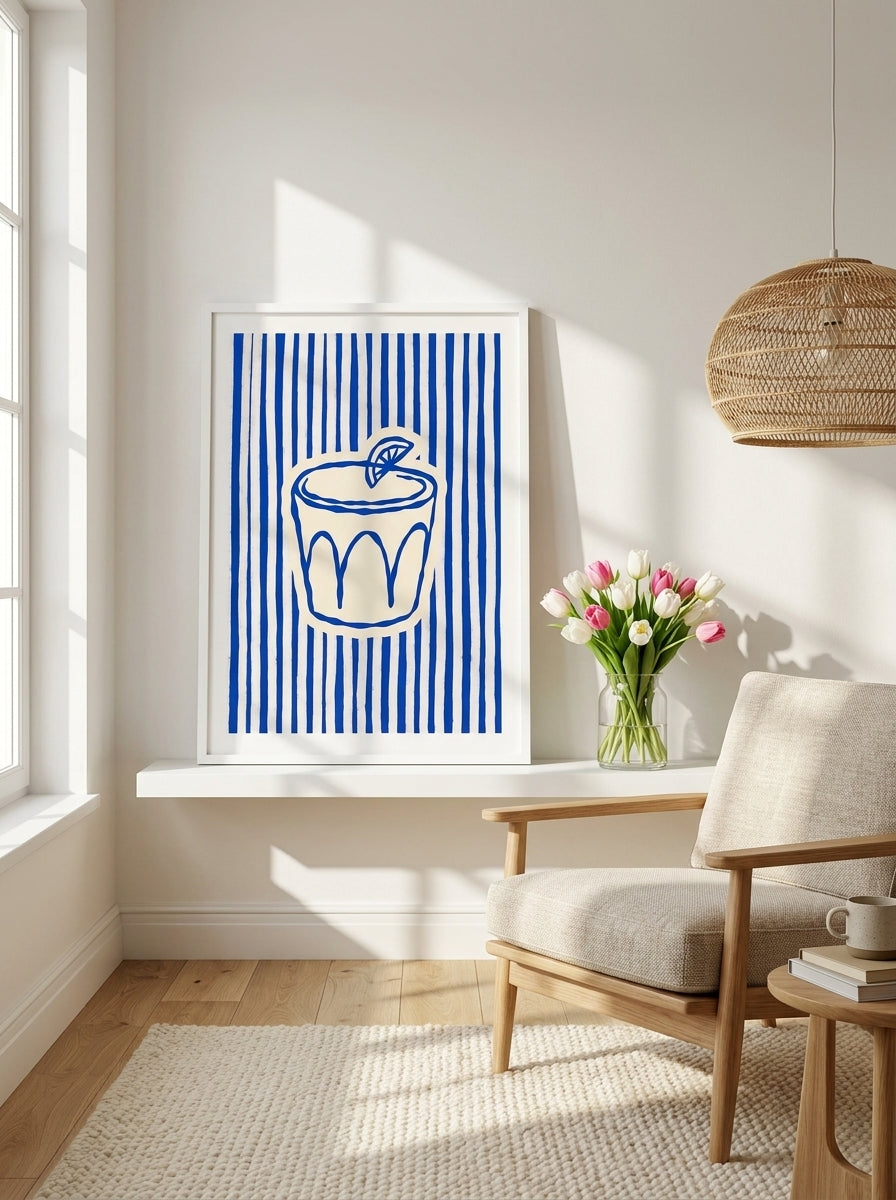 Modern wall art print standing on a shelf in a bright Scandinavian living room