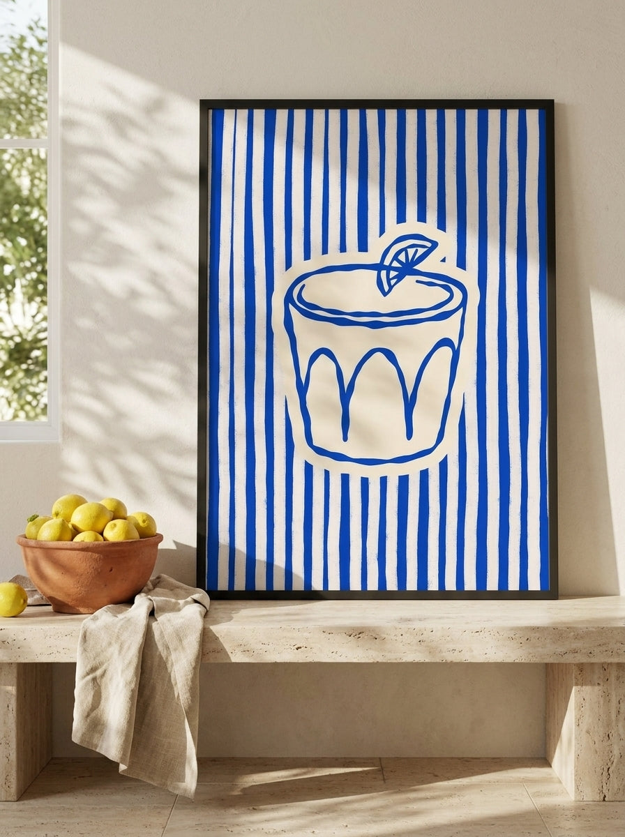 Modern wall art print standing on a kitchen bench in a Mediterranean kitchen