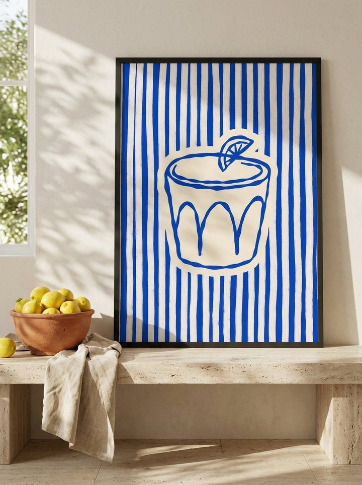 Modern wall art print standing on a kitchen bench in a Mediterranean kitchen