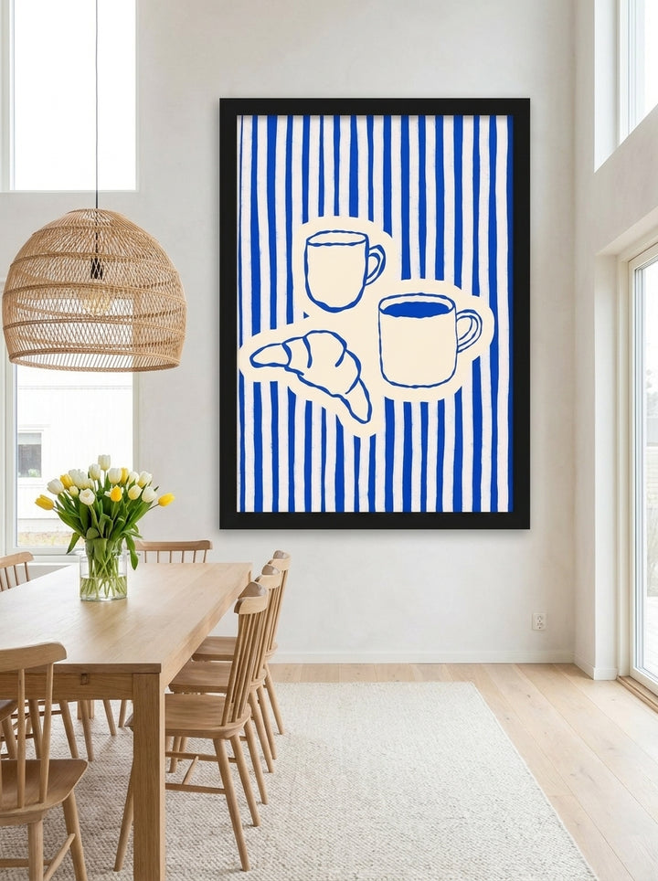 Oversized statement modern wall art print styled on the wall in a bright Scandinavian dining room