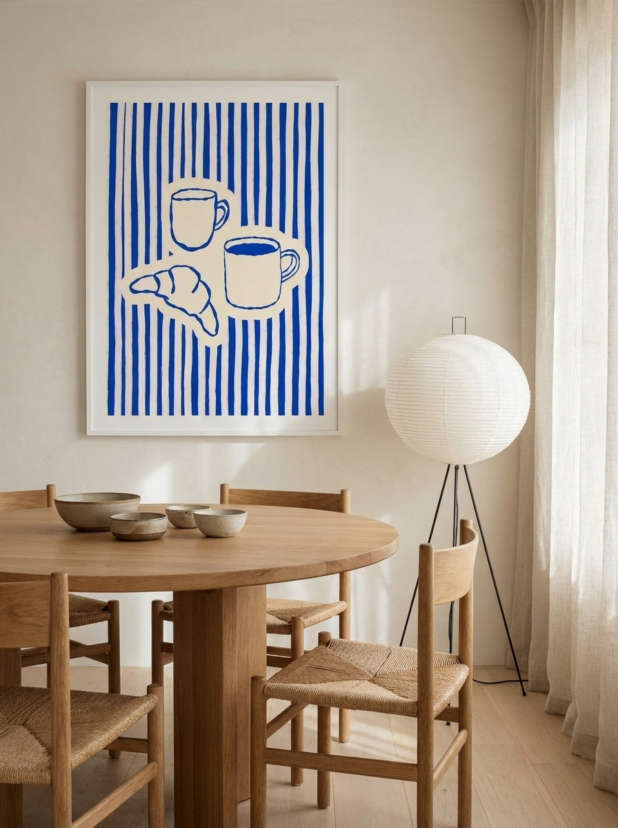 Modern wall art print styled on the wall in a warm Japandi dining room
