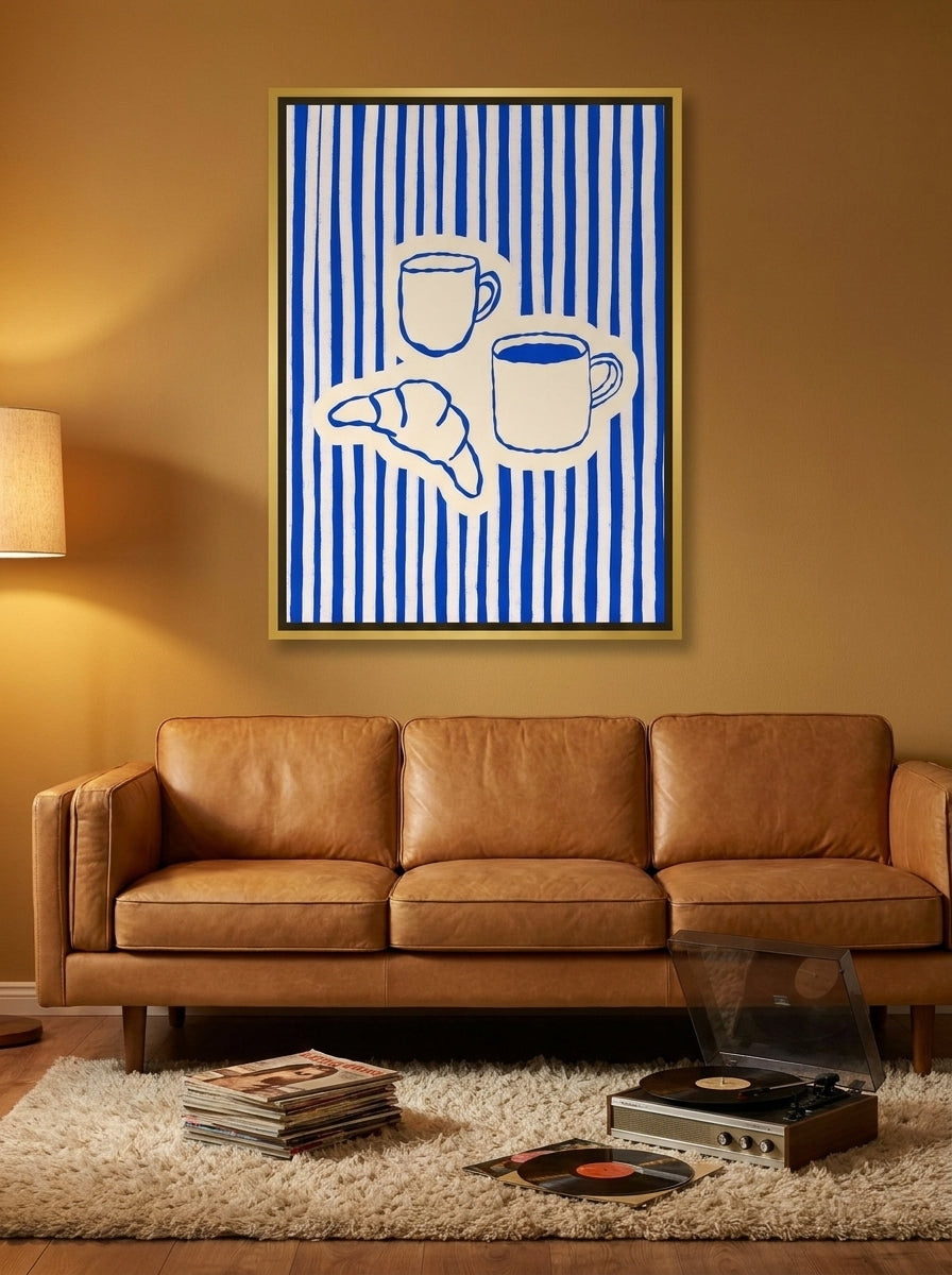 Canvas wall art with a gold leaf surround styled on the wall in a retro 70s living room