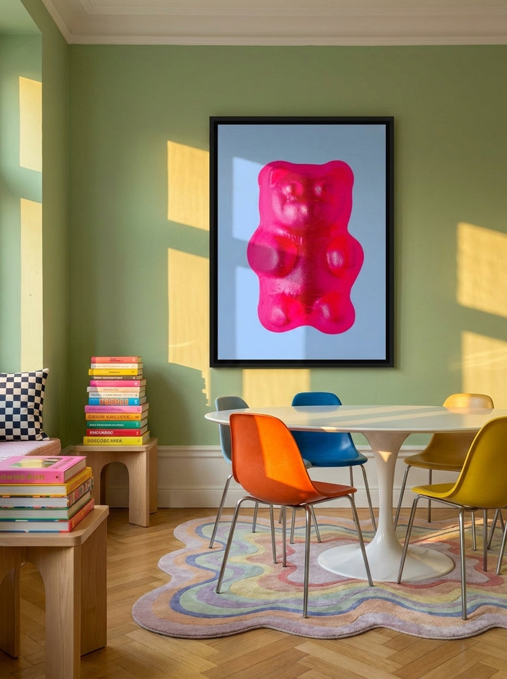 Oversized statement canvas wall art with a black surround styled on the wall in a colourful eclectic dining room