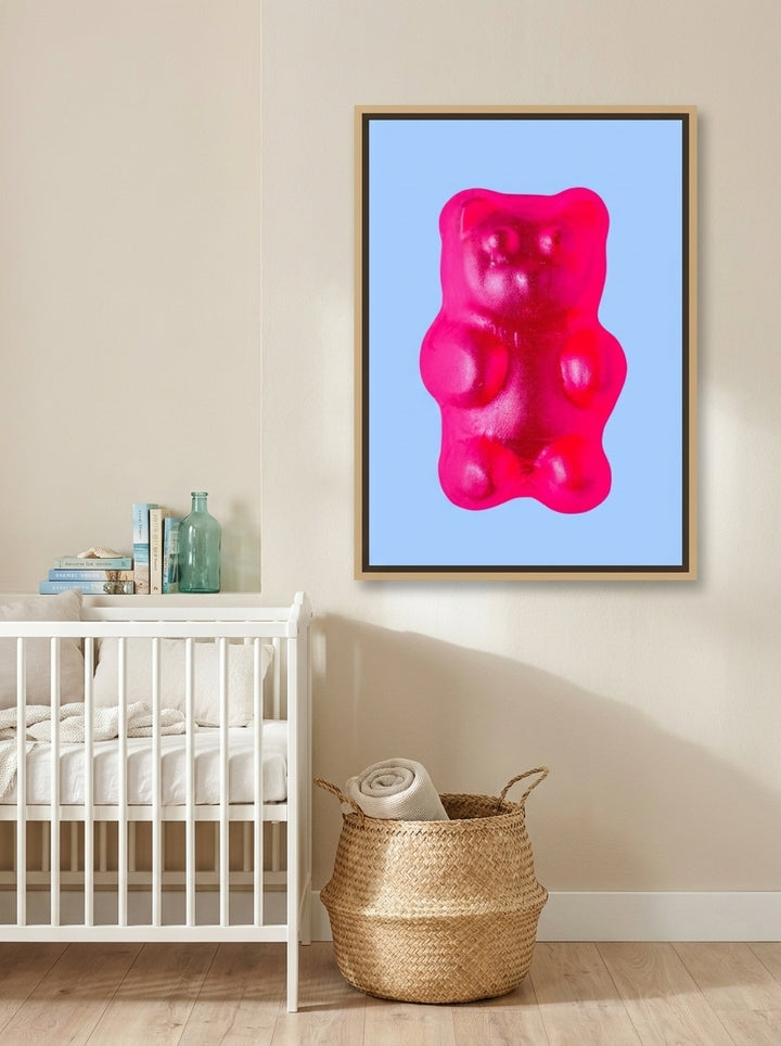 Canvas wall art with a natural timber surround styled on the wall in a coastal nursery