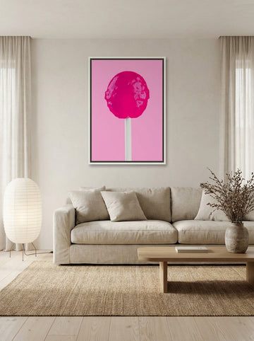 Canvas wall art with a white surround styled on the wall in a warm Japandi living room