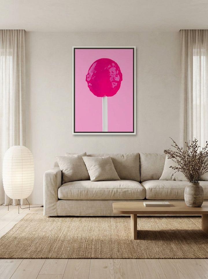 Canvas wall art with a white surround styled on the wall in a warm Japandi living room