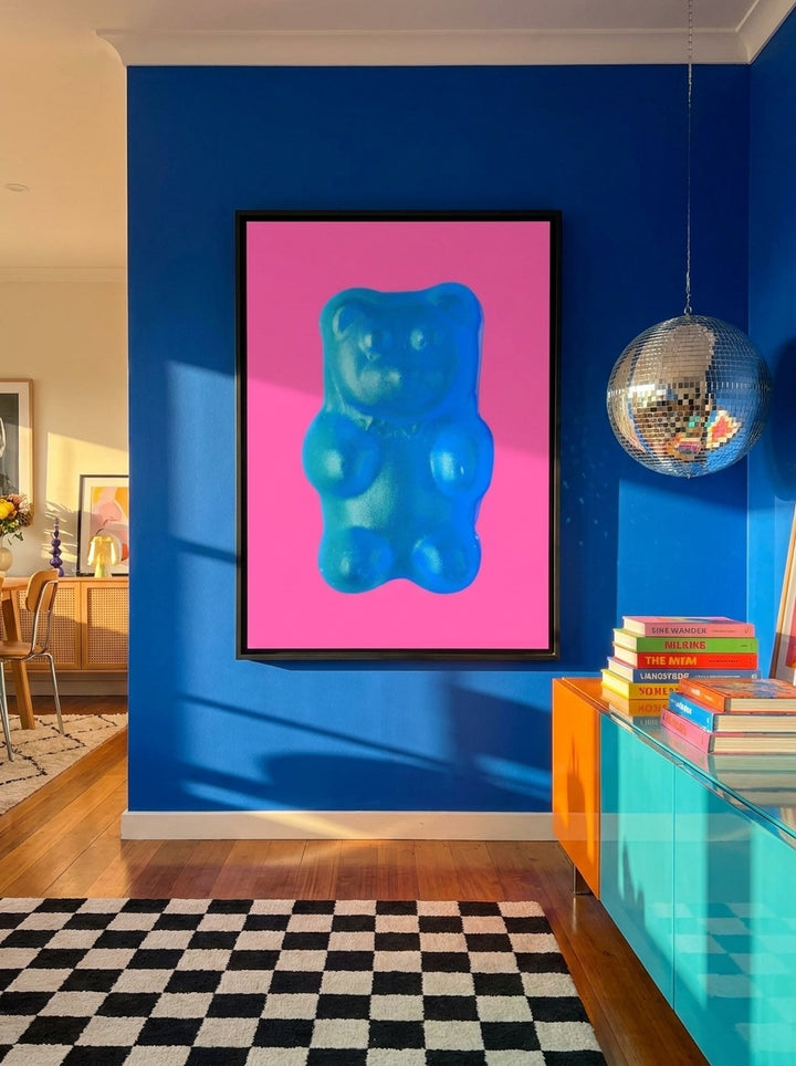 Oversized statement canvas wall art with a black surround styled on the wall in a colourful eclectic living room