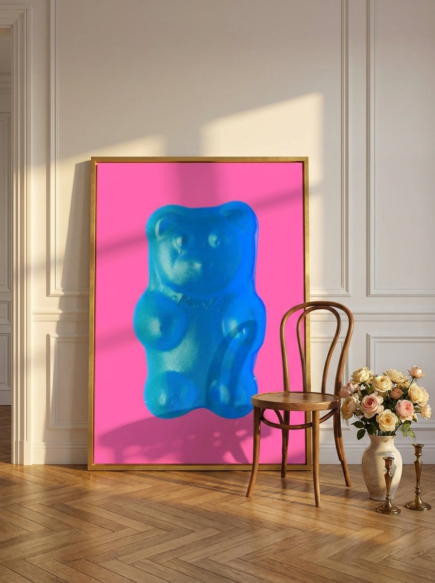 Oversized statement canvas wall art with a gold leaf surround leaning against the wall in a Parisian dining room