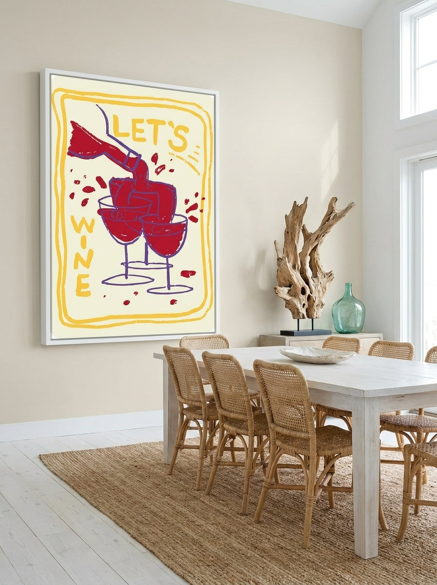 Oversized statement canvas wall art with a white surround styled on the wall in a coastal dining room